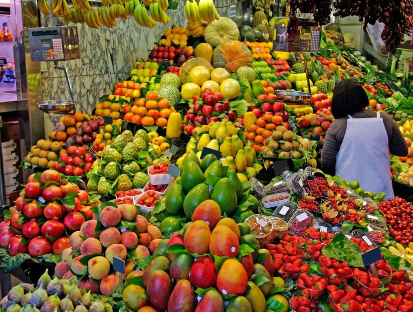 Colorful fruit and vegetable stalls at La Boqueria market, Barcelona