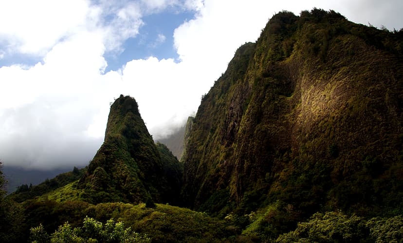 Emerald peaks rising above the valley floor in ʻĪao Valley State Park near Wailuku, Maui